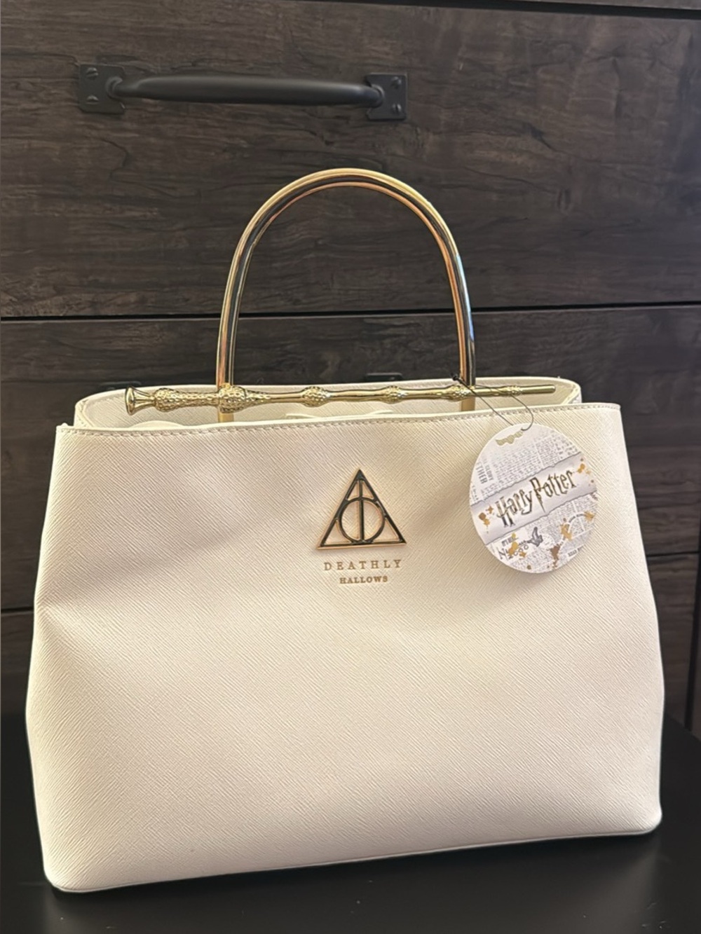 Harry Potter Cream Satchel with Gold Elder Wand Handle.